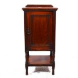 An Edwardian mahogany bedside table