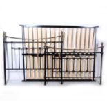 A modern metal double bedstead and base