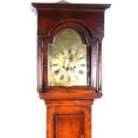 A Georgian oak longcase clock