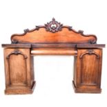 A Victorian mahogany twin pedestal sideboard