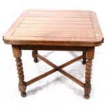An oak draw-leaf dining table, and four dining chairs