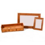 Two pine wall mirrors and a shelf with drawers