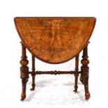 A Victorian figured walnut Sutherland table