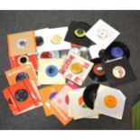 A box of aprox 350 mixed 7" single records, including Roxy Music, Patti Smith, Brinski Beat,