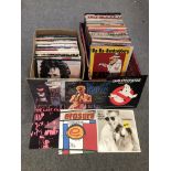Two boxes of aprox 237 12" single vinyl records; including David Bowie, Simple Minds, etc
