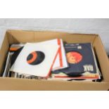 A box of aprox 250 mixed 7" single records, including The Hollies, Lulu, Abba, Dexys Midnight
