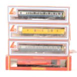 OO gauge model railway collection Royal Mail coaches and other passenger coaches.