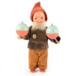 A West German clock-work wind-up gnome, felt outfit, tin-plate and plastic construction, with two