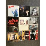 Sixteen LP and 12" single vinyl records; including six albums by Japan