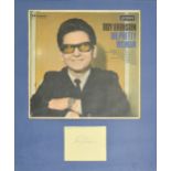 Roy Orbison; signed page mounted with vinyl album cover of 'Oh, Pretty Woman', framed and glazed,