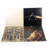 Four vinyl LP records; including, Jimi Hendrix, Led Zeppelin and Pink Floyd