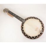 A 5 string Piccolo Zither banjo, seventeen frets, mother-of-pearl inlay to neck, 17cm full length.