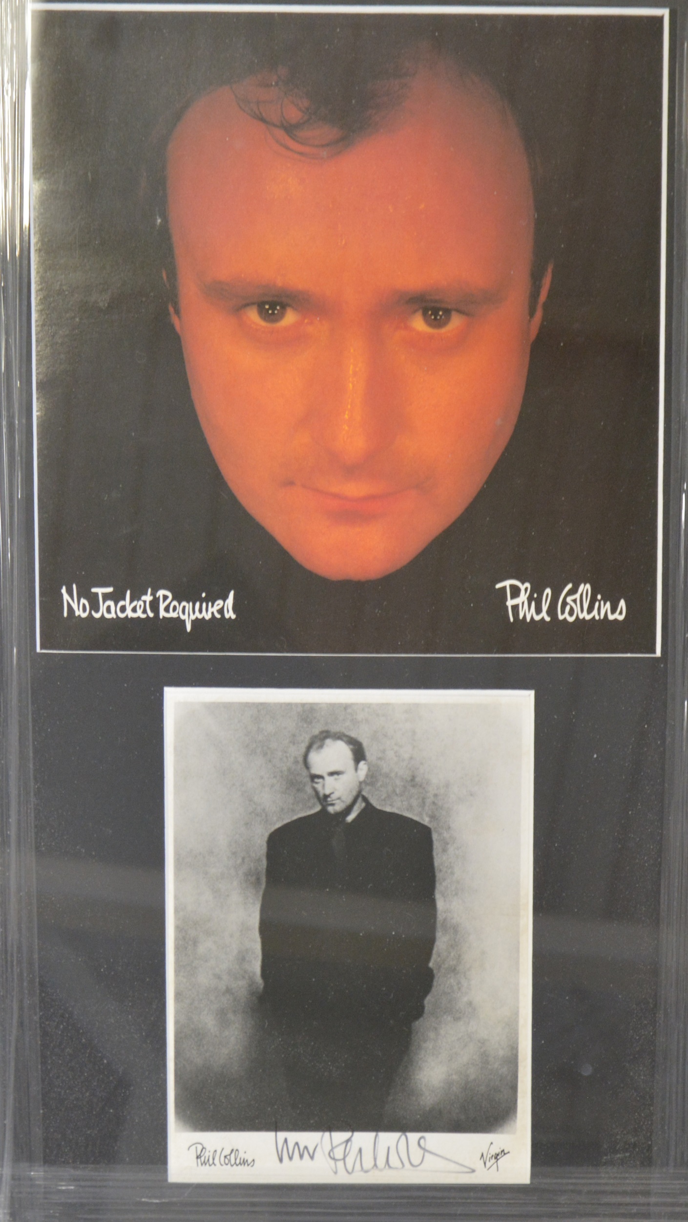 Phil Collins; signed photo, framed and glazed.