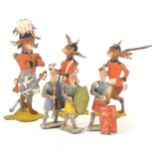Berliner Zinnfiguren type flat-ware lead painted figures; three hares in millitary outfits, tallest