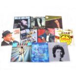 Aprox100 vinyl LP records; mostly film soundtrack, easy listening, and pop, including Elvis Presley,