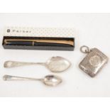 A silver vesta case, two silver spoons and a Parker pen.