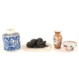 A Chinese blue and white porcelain caddy, small teabowl, miniature Japanese vase, and a snake desk