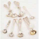 A set of four silver salt spoons by George Unite and four pairs.