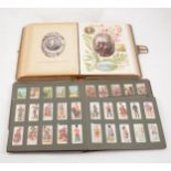 A Victorian leather bound photograph album;