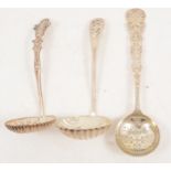 Three ornate silver sugar sifting spoons, Sheffield.