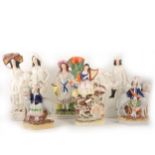 Six various Staffordshire pottery figures