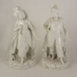 A pair of Continental porcelain figures of a courtesan and Ottoman fighter