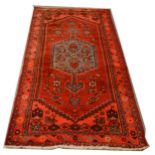 A Persian pattern rug