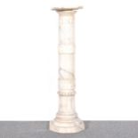 An alabaster pedestal