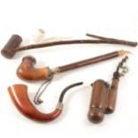 Calabash pipe and three other 19th Century pipes and a clay pipe.