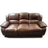 A contemporary two-piece brown leather reclining lounge suite