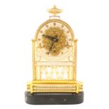 A French pierced brass and gilt metal mantel clock
