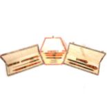 Three Art Deco amber coloured Bakelite writing sets.