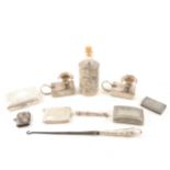 A collection of silver and silver-plated items, to include cigarette cases, Albert chains, cigar