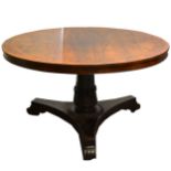 A Regency rosewood and amboyna circular tilt-top breakfast table