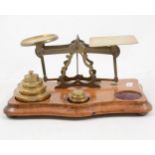 Set of mahogany and brass postal scales