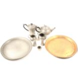 Pewter teaset, on a tray; together with a brass circular tray.