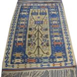 Kilim carpet, beige and blue ground with geometric patterns