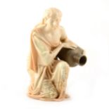 A Royal Worcester kneeling water carrier.