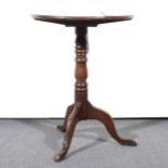 An old oak tripod table,