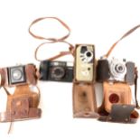 A box of miscellaneous cameras