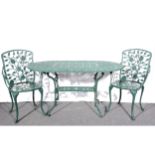 A contemporary green painted metal patio table and six chairs