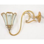 An Edwardian brass wall light,