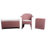 Three items of Lloyd Loom bedroom furniture