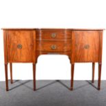 A reproduction mahogany sideboard