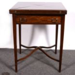 An Edwardian mahogany envelope-top card table