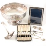 A small collection of silver and silver-plated items.