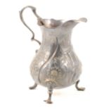 18th Century Silver cream jug, embossed decoration. G.S. London 1763.