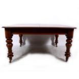 A Victorian mahogany fixed top dining table
