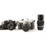 Photographic equipment: Olympus OM-1 camera; Nikon M90 camera; Nikon Nikkormat SLR camera, etc
