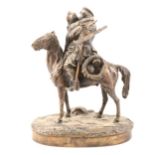A bronze group of a mounted Russian Cossack kissing his sweetheart